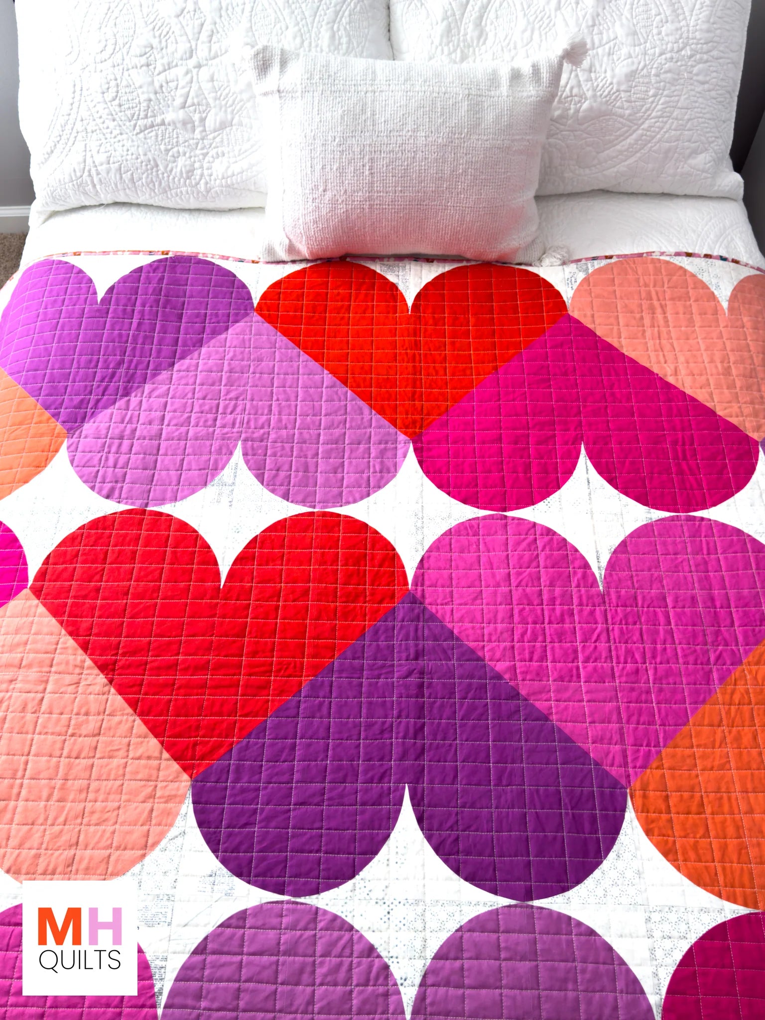 Sweetheart quilt pattern by Modern Handcraft - shown on a bed