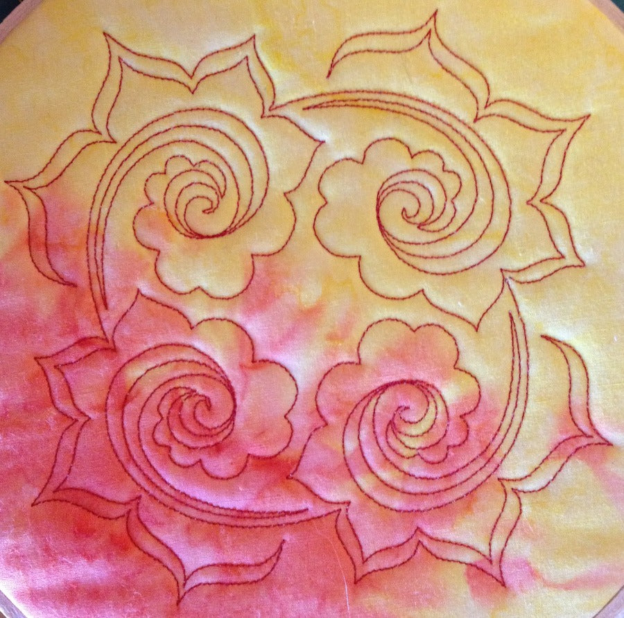 Swirling Fire digitized longarm and machine embroidery designs by Sharon Schamber